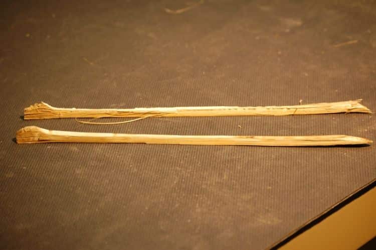 Rough split chopstick and one finished on tool.
