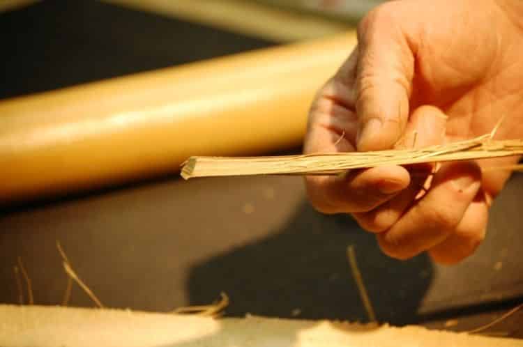 The strongest part of the the bamboo is the outside of the cane, so always cut to angle inward.